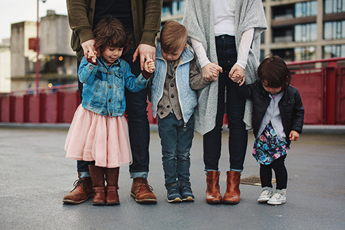 Family of five standing together